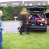 Steve watching as Andy, in a blur of activity, packs the last of the gear into the van
